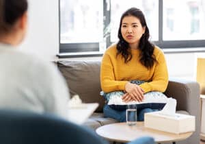 Person learning about marijuana addiction treatment