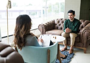 Two people talking about polysubstance abuse treatment